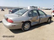 ✅ 1999 Chevrolet Lumina • VIN: 2G1WL52M5X9126135 • Лот: 70958174. Опубликован ранее на Copart с пробегом 171 336 миль. Бесплатный доступ к архиву аукционных продаж из США и подробный отчёт об истории автомобиля на DreamBid. Изображение 3.