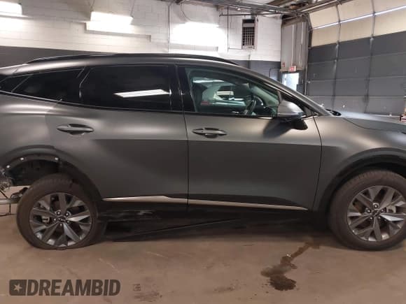 ✅ 2025 Kia Sportage SX-Prestige • VIN: KNDPXCDG9S7190801 • Лот: 42157106. Опубликован ранее на IAAI с пробегом 1 377 миль. Бесплатный доступ к архиву аукционных продаж из США и подробный отчёт об истории автомобиля на DreamBid. Изображение 13.
