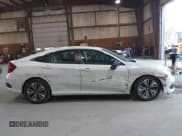 ✅ 2017 Honda Civic EX-L • VIN: 19XFC1F76HE208396 • Lot: 43208450. Listed on IAAI with 75,981 mi. Free auction sales archive from the USA and detailed vehicle history report at DreamBid. Image 14.