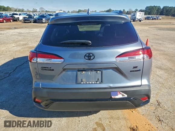 ✅ 2023 Toyota Corolla Cross Hybrid SE • VIN: 7MUFBABG1PV011879 • Lot: 94373575. Wystawiony na Copart z przebiegiem 9 744 mil. Bezpłatny archiwum sprzedaży aukcyjnych z USA i szczegółowy raport historii pojazdu na DreamBid. Zdjęcie 6.