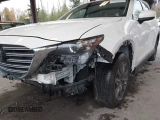 ✅ 2022 Mazda CX-9 Touring • VIN: JM3TCBCY2N0605430 • Лот: 43701810. Опубликован ранее на IAAI с пробегом 78 762 миль. Бесплатный доступ к архиву аукционных продаж из США и подробный отчёт об истории автомобиля на DreamBid. Изображение 6.