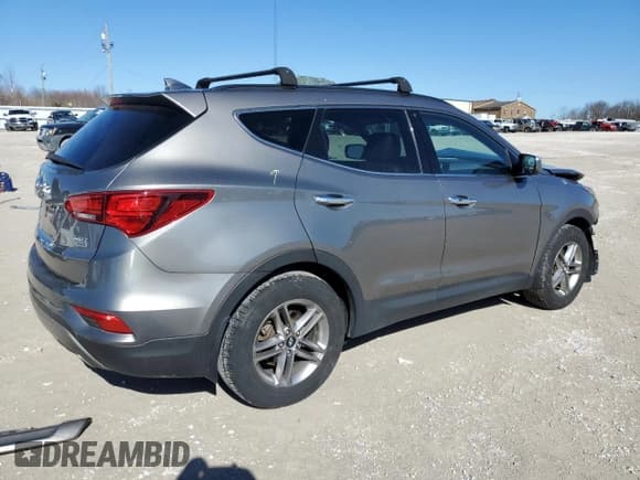 ✅ 2017 Hyundai Santa Fe 2.4L • VIN: 5NMZUDLB9HH050262 • Лот: 41228764. Опубликован ранее на Copart с пробегом 89 741 миль. Бесплатный доступ к архиву аукционных продаж из США и подробный отчёт об истории автомобиля на DreamBid. Изображение 3.