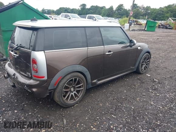 ✅ 2009 MINI Clubman S • VIN: WMWMM33569TP89990 • Lot: 42869350. Listed on IAAI with 94,090 mi. Free auction sales archive from the USA and detailed vehicle history report at DreamBid. Image 4.