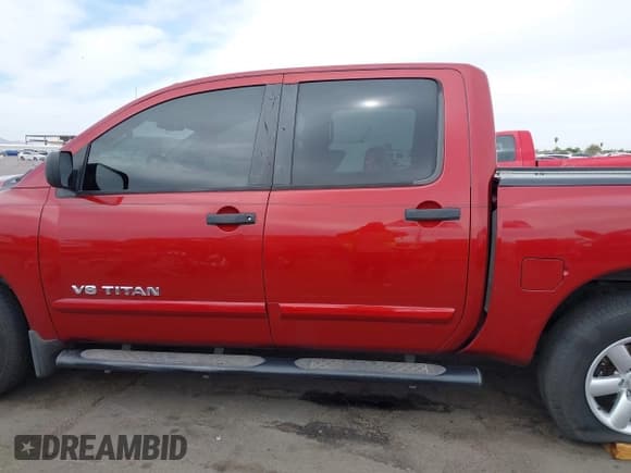 ✅ 2013 Nissan Titan SL • VIN: 1N6AA0ED3DN305950 • Lot: 42374871. Listed on IAAI with 235,407 mi. Free auction sales archive from the USA and detailed vehicle history report at DreamBid. Image 14.