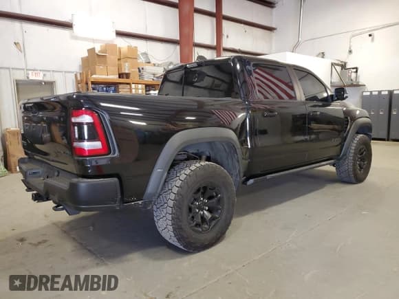 ✅ 2021 Ram 1500 TRX • VIN: 1C6SRFU90MN900150 • Lot: 82398365. Wystawiony na Copart z przebiegiem 43 714 mil. Bezpłatny archiwum sprzedaży aukcyjnych z USA i szczegółowy raport historii pojazdu na DreamBid. Zdjęcie 3.