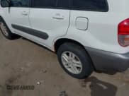 ✅ 2001 Toyota RAV4 • VIN: JTEGH20VX10009705 • Lot: 43210667. Listed on IAAI with 183,636 mi. Free auction sales archive from the USA and detailed vehicle history report at DreamBid. Image 6.