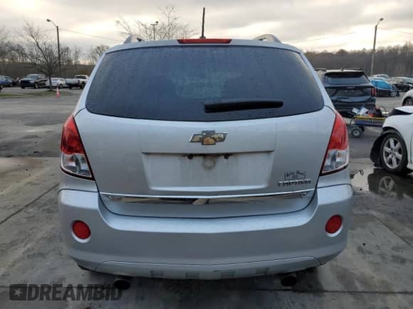 2012 Chevrolet Captiva Sport LT с VIN 3GNAL3E55CS590072, выставлен на аукционе Copart как лот 81828484 с пробегом 130 616 миль миль и Списание • Salvage title. История ставок и продаж доступна на DreamBid. Изображение 6.
