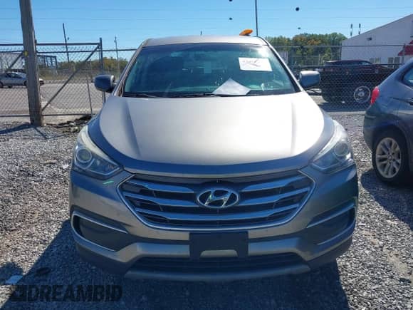 2018 Hyundai Santa Fe 2.4L z VIN 5XYZT3LB7JG556833, wystawiony jako IAAI lot #43456339 z przebiegiem 153 359 mil mil oraz . Historia ofert i sprzedaży dostępna na DreamBid. Obrazek 12.