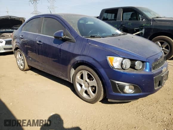 2014 Chevrolet Sonic LTZ с VIN 1G1JE5SB1E4177537, выставлен на аукционе Copart как лот 72123994 с пробегом 116 424 миль миль и Списание • Salvage title. История ставок и продаж доступна на DreamBid. Изображение 4.