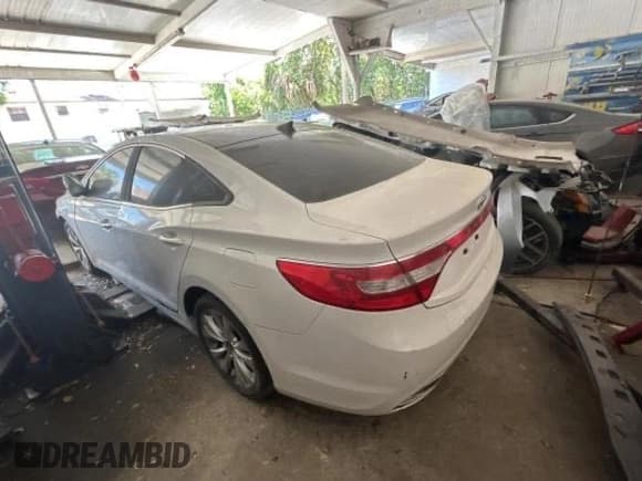 ✅ 2013 Hyundai Azera • VIN: KMHFG4JG4DA283684 • Лот: 62190285. Опубликован ранее на Copart с пробегом 58 994 миль. Бесплатный доступ к архиву аукционных продаж из США и подробный отчёт об истории автомобиля на DreamBid. Изображение 3.