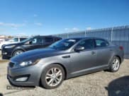 ✅ 2013 Kia Optima EX • VIN: 5XXGN4A71DG209884 • Lot: 92099775. Wystawiony na Copart z przebiegiem 169 018 mil. Bezpłatny archiwum sprzedaży aukcyjnych z USA i szczegółowy raport historii pojazdu na DreamBid. Zdjęcie 1.