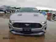 2021 Ford Mustang EcoBoost with VIN 1FA6P8TH7M5137392, listed as a Copart auction lot 64767285 with 100,212 mi miles and Salvage title. Bid and sale history available at DreamBid. Image 5.