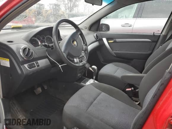 2009 Chevrolet Aveo 2LT z VIN KL1TG56E59B669785, wystawiony jako Copart lot #79399654 z przebiegiem 142 951 mil mil oraz Szkoda całkowita • Salvage title. Historia ofert i sprzedaży dostępna na DreamBid. Obrazek 7.