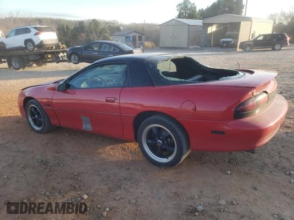 2002 Chevrolet Camaro Z28 z VIN 2G1FP22G722148992, wystawiony jako Copart lot #86623824 z przebiegiem 86 909 mil mil oraz Szkoda całkowita • Salvage title. Historia ofert i sprzedaży dostępna na DreamBid. Obrazek 2.