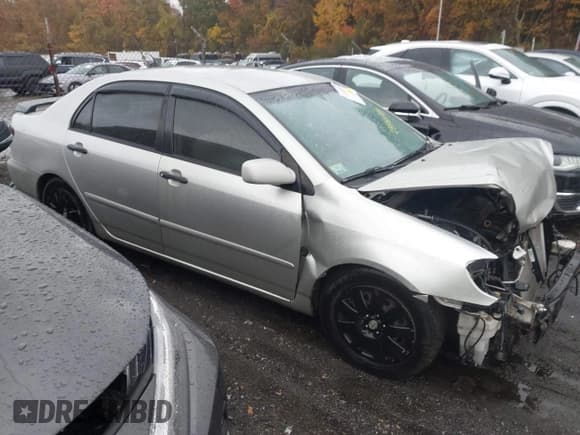 ✅ 2003 Toyota Corolla CE • VIN: JTDBR32E130005852 • Lot: 43488589. Listed on IAAI with 127,736 mi. Free auction sales archive from the USA and detailed vehicle history report at DreamBid. Image 14.