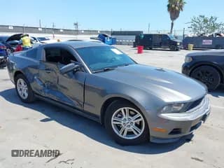 ✅ 2011 Ford Mustang V6 • VIN: 1ZVBP8AM5B5165520 • Lot: 42767448. Listed on IAAI with 212,134 mi. Free auction sales archive from the USA and detailed vehicle history report at DreamBid. Image 1.