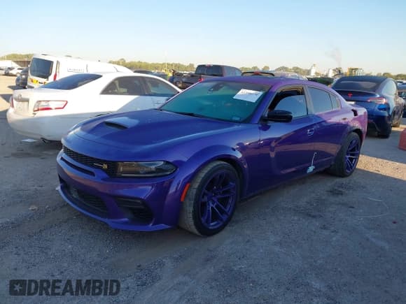 ✅ 2023 Dodge Charger Scat Pack Widebody • VIN: 2C3CDXGJ3PH624989 • Lot: 43398270. Listed on IAAI with 42,494 mi. Free auction sales archive from the USA and detailed vehicle history report at DreamBid. Image 2.