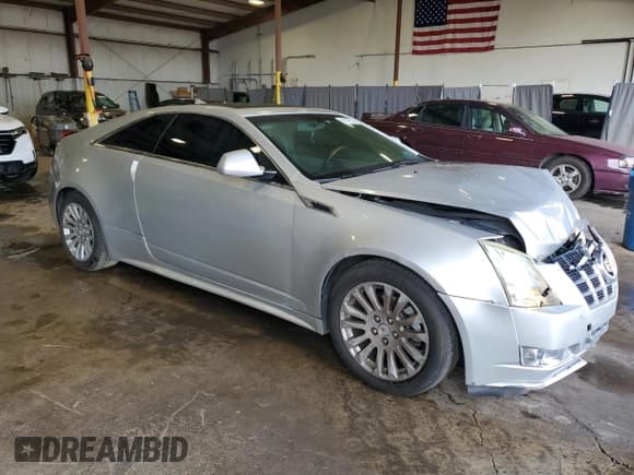 ✅ 2012 Cadillac CTS Performance • VIN: 1G6DL1E32C0107317 • Lot: 67079305. Listed on Copart with 77,130 mi. Free auction sales archive from the USA and detailed vehicle history report at DreamBid. Image 4.