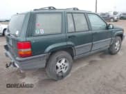 ✅ 1994 Jeep Grand Cherokee Laredo • VIN: 1J4GZ58S0RC216914 • Lot: 43577799. Listed on IAAI with 334,197 mi. Free auction sales archive from the USA and detailed vehicle history report at DreamBid. Image 4.