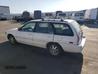 ✅ 1995 Ford Escort • VIN: 3FASP15J0SR164269 • Лот: 75297324. Опубликован ранее на Copart с пробегом 95 548 миль. Бесплатный доступ к архиву аукционных продаж из США и подробный отчёт об истории автомобиля на DreamBid. Изображение 2.