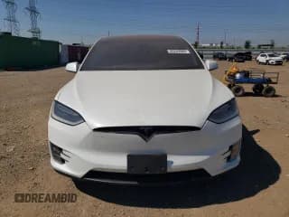 ✅ 2018 Tesla Model X 75D • VIN: 5YJXCDE27JF113132 • Lot: 80289885. Listed on Copart with Not provided. Free auction sales archive from the USA and detailed vehicle history report at DreamBid. Image 5.