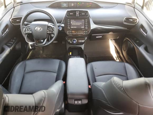 2021 Toyota Prius L Eco с VIN JTDKAMFU1M3138206, выставлен на аукционе Copart как лот 80360175 с пробегом 67 910 миль миль и Списание • Salvage title. История ставок и продаж доступна на DreamBid. Изображение 8.