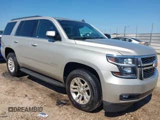 2015 Chevrolet Tahoe LT z VIN 1GNSKBKC9FR264772, wystawiony jako IAAI lot #43097216 z przebiegiem 190 907 mil mil oraz . Historia ofert i sprzedaży dostępna na DreamBid. Obrazek 1.