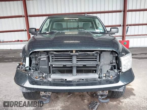 2016 Ram 1500 SLT with VIN 3C6JR7ET4GG283909, listed as a IAAI auction lot 43462033 with 91,066 mi miles and . Bid and sale history available at DreamBid. Image 13.