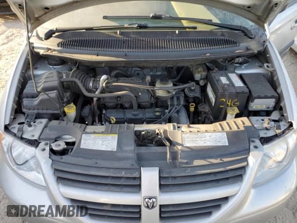 2007 Dodge Caravan SXT с VIN 1D4GP45RX7B148425, выставлен на аукционе Copart как лот 76703784 с пробегом 117 751 миль миль и На запчасти • Non repairable. История ставок и продаж доступна на DreamBid. Изображение 12.