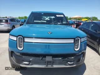 ✅ 2022 Rivian R1T Adventure • VIN: 7FCTGAAA4NN016700 • Lot: 49730914. Wystawiony na Copart z przebiegiem 33 339 mil. Bezpłatny archiwum sprzedaży aukcyjnych z USA i szczegółowy raport historii pojazdu na DreamBid. Zdjęcie 5.