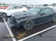 ✅ 2014 Dodge Challenger SXT • VIN: 2C3CDYAG9EH181733 • Lot: 42230945. Listed on IAAI with 156,995 mi. Free auction sales archive from the USA and detailed vehicle history report at DreamBid. Image 2.