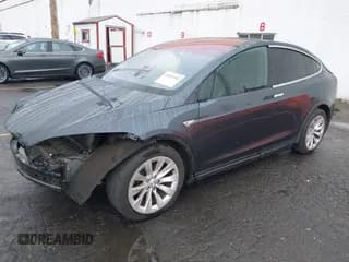 ✅ 2016 Tesla Model X 70D • VIN: 5YJXCBE29GF019542 • Lot: 43453345. Listed on IAAI with 127,876 mi. Free auction sales archive from the USA and detailed vehicle history report at DreamBid. Image 2.