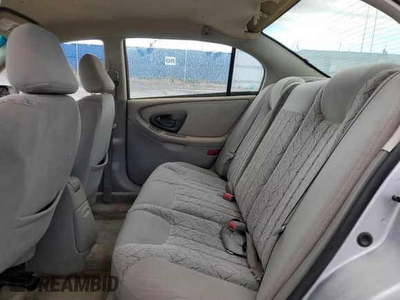 2003 Chevrolet Malibu LS with VIN 1G1NE52J23M633082, listed as a Copart auction lot 79299664 with 149,574 mi miles and Salvage title. Bid and sale history available at DreamBid. Image 10.