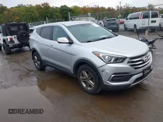 2018 Hyundai Santa Fe 2.4L z VIN 5XYZTDLB0JG533030, wystawiony jako IAAI lot #43434007 z przebiegiem 124 135 mil mil oraz . Historia ofert i sprzedaży dostępna na DreamBid. Obrazek 1.