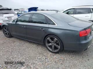 ✅ 2013 Audi S8 • VIN: WAUD2AFD1DN030416 • Лот: 41946932. Опубликован ранее на IAAI с пробегом 117 799 миль. Бесплатный доступ к архиву аукционных продаж из США и подробный отчёт об истории автомобиля на DreamBid. Изображение 3.