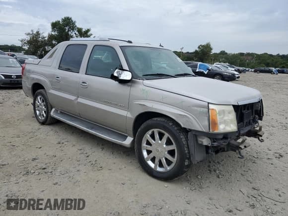 ✅ 2004 Cadillac Escalade EXT • VIN: 3GYEK62N94G205632 • Лот: 80814005. Опубликован ранее на Copart с пробегом 88 689 миль. Бесплатный доступ к архиву аукционных продаж из США и подробный отчёт об истории автомобиля на DreamBid. Изображение 4.