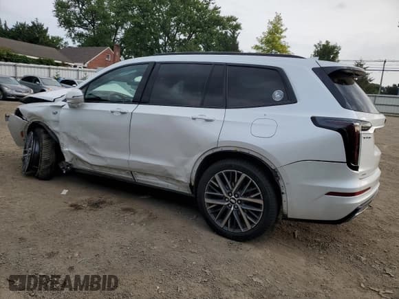 ✅ 2022 Cadillac XT6 Sport • VIN: 1GYKPGRS4NZ174846 • Lot: 64271474. Listed on Copart with 57,891 mi. Free auction sales archive from the USA and detailed vehicle history report at DreamBid. Image 2.