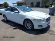 ✅ 2012 Jaguar XJ • VIN: SAJWA1CB4CLV33824 • Lot: 42279485. Listed on IAAI with 147,376 mi. Free auction sales archive from the USA and detailed vehicle history report at DreamBid. Image 1.