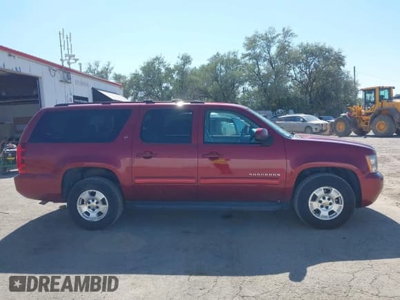 ✅ 2010 Chevrolet Suburban LT • VIN: 1GNUKJE33AR134610 • Lot: 43041388. Listed on IAAI with 287,174 mi. Free auction sales archive from the USA and detailed vehicle history report at DreamBid. Image 13.