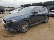 ✅ 2020 Mazda CX-5 Grand Touring Reserve • VIN: JM3KFBAY4L0866965 • Lot: 81674835. Listed on Copart with 41,530 mi. Free auction sales archive from the USA and detailed vehicle history report at DreamBid. Image 1.