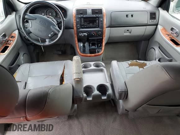 ✅ 2004 Kia Sedona LX • VIN: KNDUP131246574125 • Lot: 85572875. Listed on Copart with 147,545 mi. Free auction sales archive from the USA and detailed vehicle history report at DreamBid. Image 8.