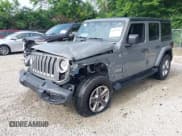 ✅ 2022 Jeep Wrangler Unlimited Sahara • VIN: 1C4HJXEN2NW239826 • Lot: 42497327. Listed on IAAI with 36,754 mi. Free auction sales archive from the USA and detailed vehicle history report at DreamBid. Image 2.
