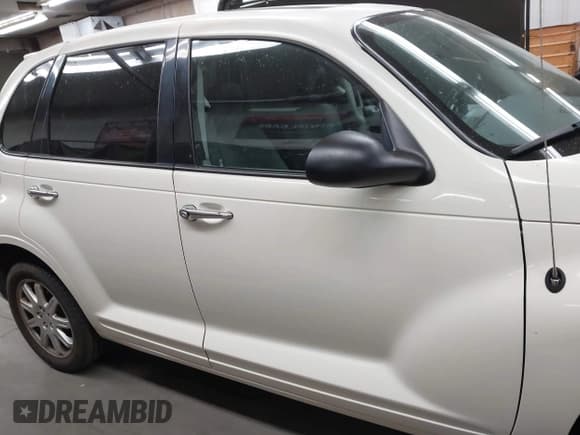 ✅ 2007 Chrysler PT Cruiser Limited • VIN: 3A8FY68B57T608436 • Lot: 42138553. Wystawiony na IAAI z przebiegiem 97 419 mil. Bezpłatny archiwum sprzedaży aukcyjnych z USA i szczegółowy raport historii pojazdu na DreamBid. Zdjęcie 13.