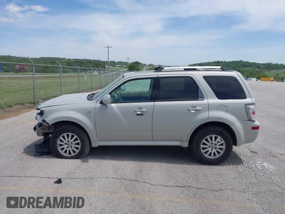 2009 Mercury Mariner Premier with VIN 4M2CU87799KJ21771, listed as a IAAI auction lot 42256896 with 107,667 mi miles and . Bid and sale history available at DreamBid. Image 14.