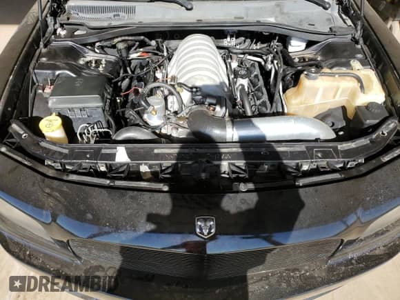 2008 Dodge Charger SRT-8 с VIN 2B3LA73W18H198034, выставлен на аукционе Copart как лот 66955345 с пробегом 30 292 миль миль и Чистый • Clean title. История ставок и продаж доступна на DreamBid. Изображение 11.