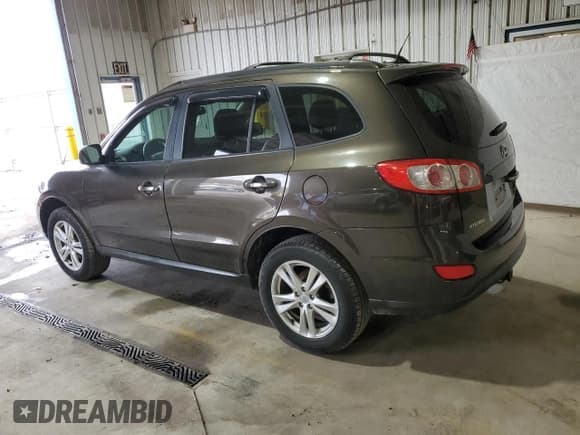✅ 2011 Hyundai Santa Fe Limited • VIN: 5XYZKDAG3BG084994 • Lot: 84524164. Listed on Copart with 238,391 mi. Free auction sales archive from the USA and detailed vehicle history report at DreamBid. Image 2.