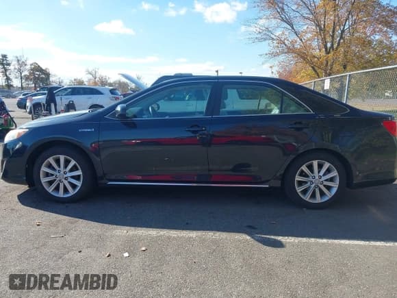 ✅ 2012 Toyota Camry LE • VIN: 4T1BD1FK8CU028648 • Lot: 43528387. Listed on IAAI with 128,314 mi. Free auction sales archive from the USA and detailed vehicle history report at DreamBid. Image 14.