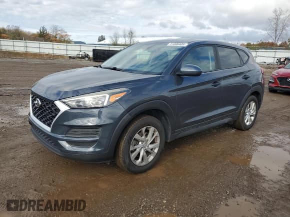 ✅ 2019 Hyundai Tucson SE • VIN: KM8J23A47KU933211 • Лот: 91000405. Опубликован ранее на Copart с пробегом 172 450 миль. Бесплатный доступ к архиву аукционных продаж из США и подробный отчёт об истории автомобиля на DreamBid. Изображение 1.