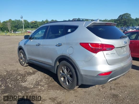 ✅ 2014 Hyundai Santa Fe • VIN: 5XYZUDLB4EG205418 • Lot: 43058157. Listed on IAAI with 137,818 mi. Free auction sales archive from the USA and detailed vehicle history report at DreamBid. Image 3.