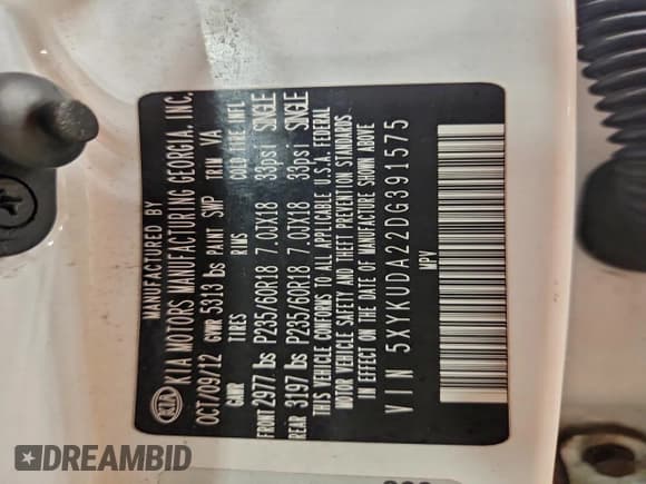 ✅ 2013 Kia Sorento EX • VIN: 5XYKUDA22DG391575 • Lot: 94121005. Listed on Copart with 102,798 mi. Free auction sales archive from the USA and detailed vehicle history report at DreamBid. Image 13.